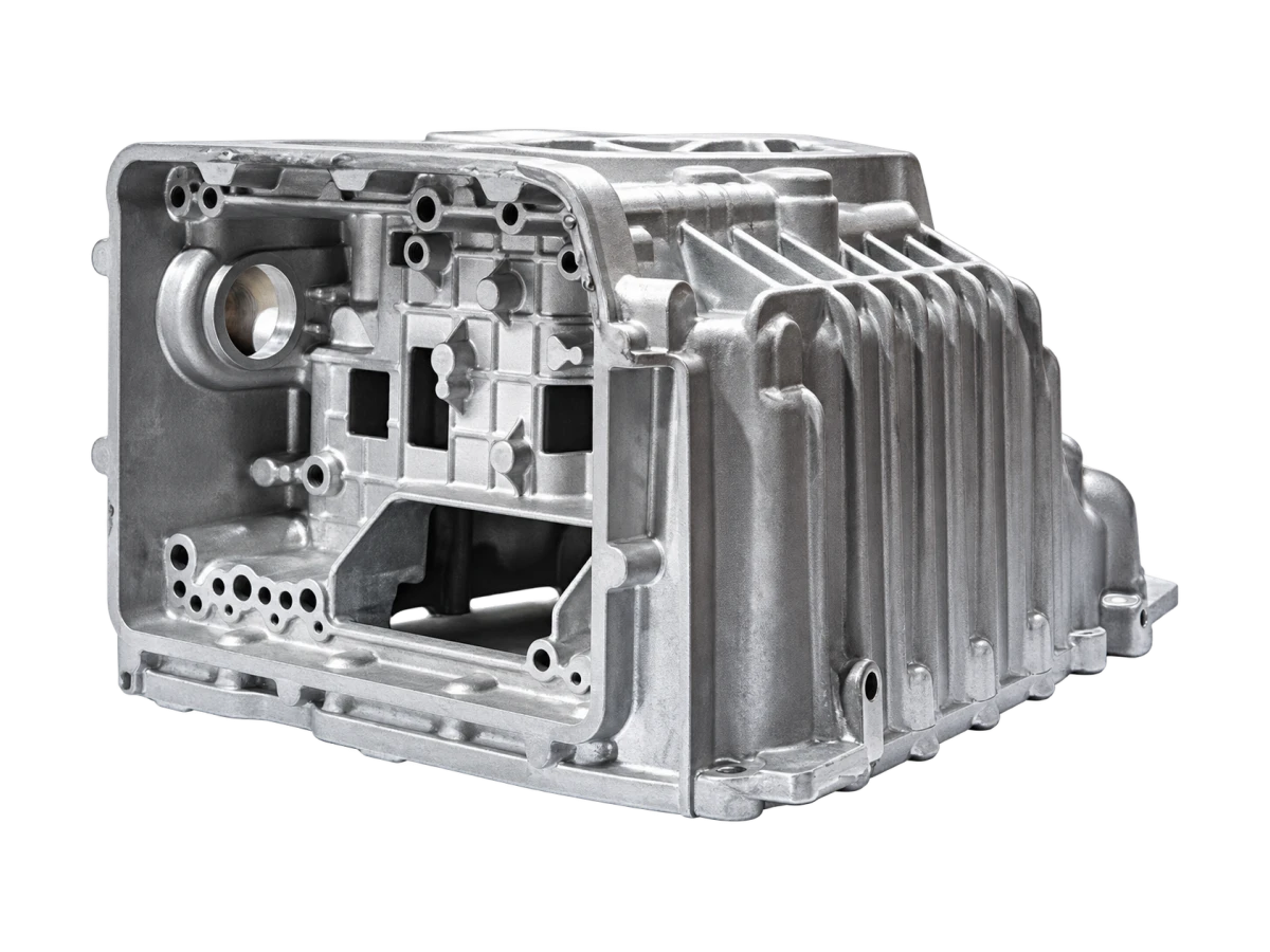 Aluminum casting with machined openings and integral cooling ribs